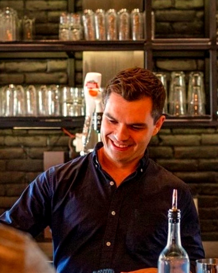 Henry behind the bar
